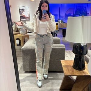 Distressed Light Blue Jeans